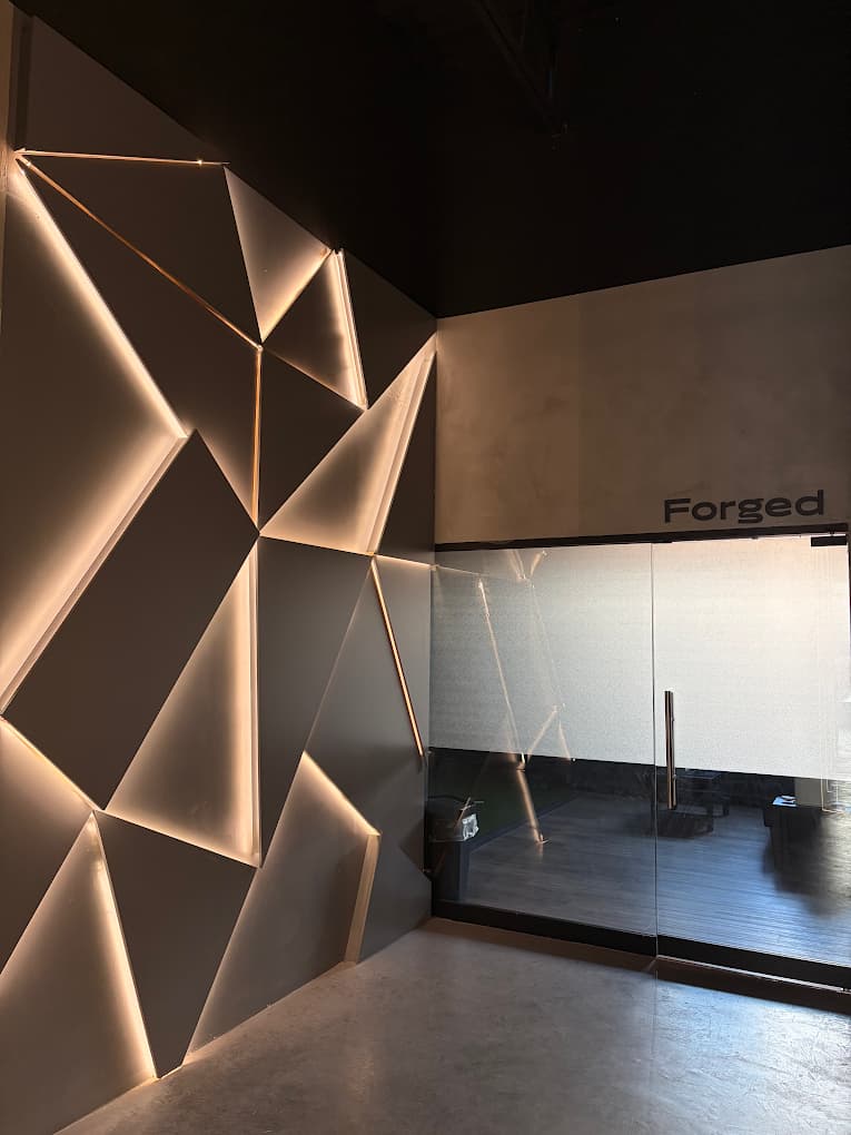 Forged Golf indoor golf simulator room in Mississauga