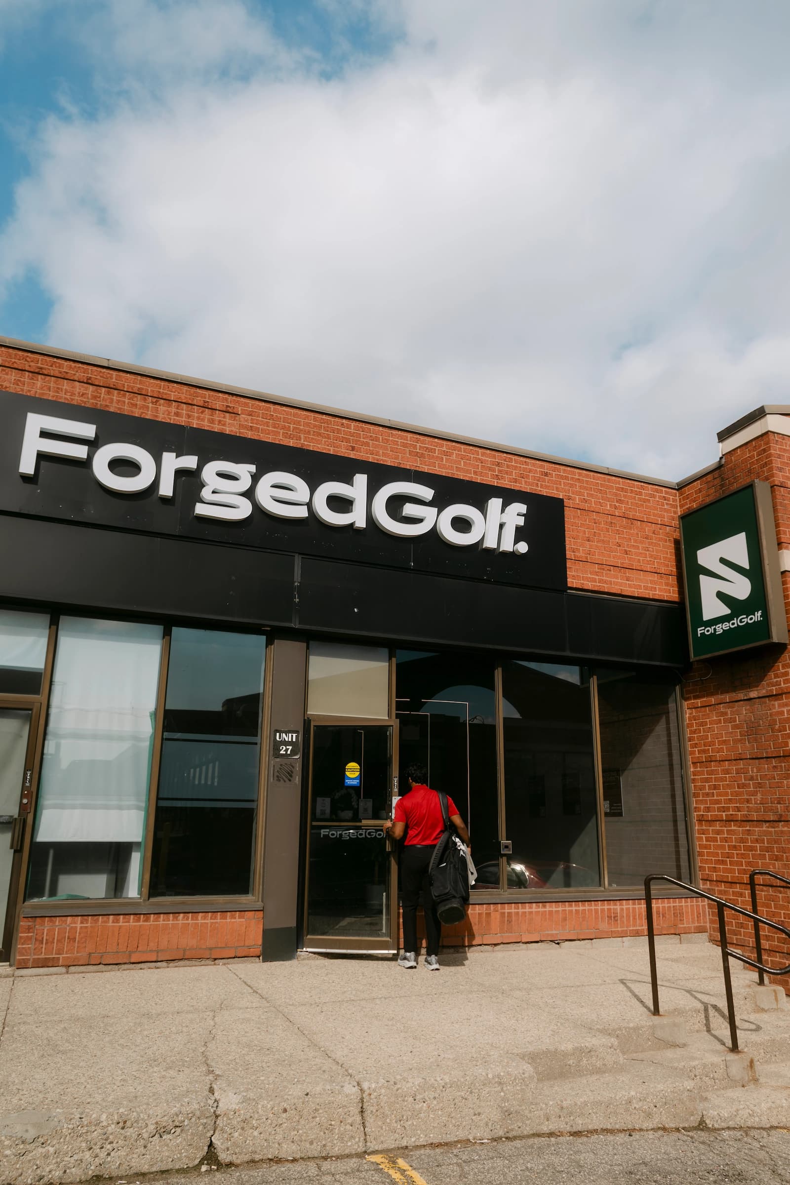 Storefront entrance of Forged Golf indoor golf simulator in Mississauga