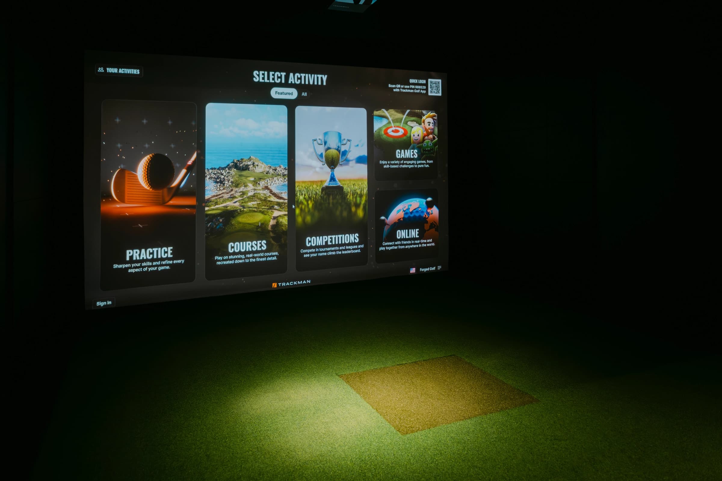 Trackman bay for indoor golf practice and simulator play at Forged Golf